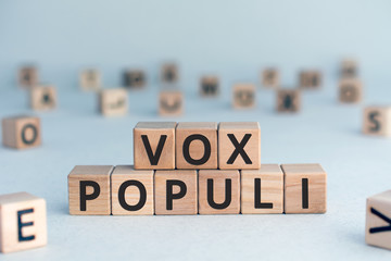 vox populi - Latin words from wooden blocks with letters, opinions of people vox pop voice of the...
