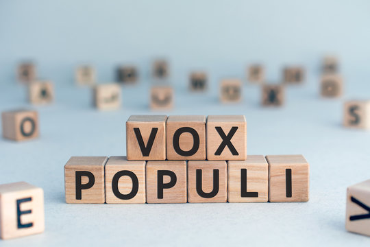 vox populi - Latin words from wooden blocks with letters, opinions of people vox pop voice of the people concept, random letters around, white  background