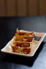 Japanese gyoza or dumplings snack with soy sauce