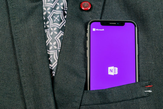 Sankt-Petersburg, Russia, August 24, 2018: Microsoft OneNote office application icon on Apple iPhone X screen in jacket. Microsoft One Note app icon. Microsoft OneNote application. Social media
