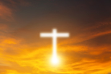 Conceptual wood cross or religion symbol shape over a sunset sky with clouds background for God. belief or resurrection of god and worship christian. sky freedom.