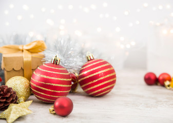 Christmas Ornaments On White Wood With Glittering Background