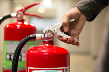 Fire extinguishers, Engineers are checking fire extinguishers.
