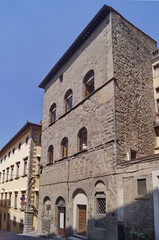 Fototapeta na wymiar Ancient palace in the historical center of Cortona, Tuscany, Italy