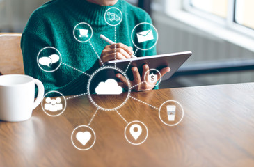 Asian women using digital tablet in office to operate the network, e commerce online at the office, The media reaches the operational guidelines, for panoramic banner background with copy space