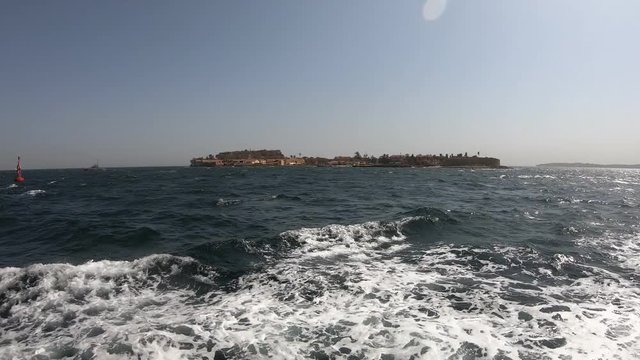 Timelapse approaching Ile de Goree ("Slave Island") in Dakar, Senegal by boat