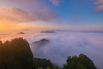 beautiful, spectacular sunrise above the clouds at the top of Three Crowns-Pieniny, Poland