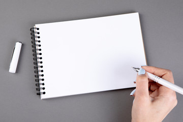 Woman hand with pencil 