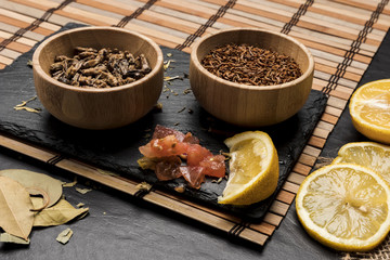 Wooden bowls full with insects