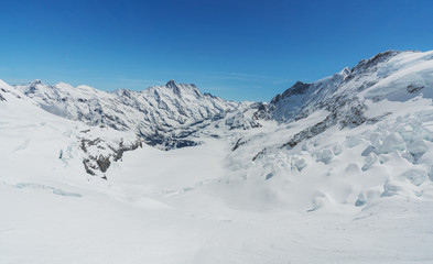Fototapeta na wymiar Panoramic winter mountain in Swiss alps mountain range, Switzerland