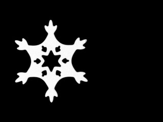 Snowflake on a black background. Christmas and New Year concept