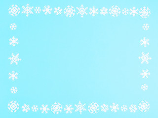 Snowflakes on a blue background. Winter holidays concept
