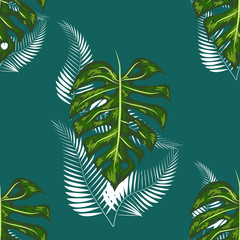 Fototapeta na wymiar Bright tropical background with jungle plants. exotic pattern with palm leaves.
