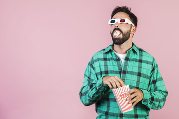 Medium shot guy with mouth full of popcorn