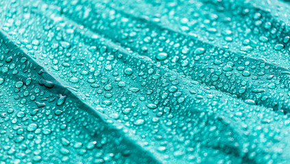 Obraz premium Raindrops on a tent as an abstract background