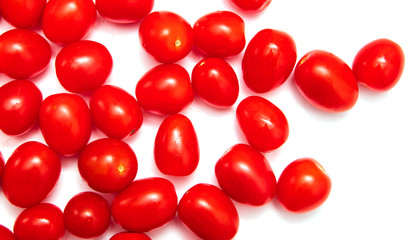 Red cherry tomatoes on a white background