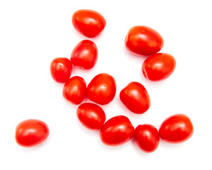 Red cherry tomatoes on a white background