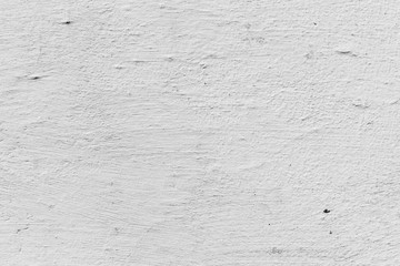 Texture of a concrete wall with cracks and scratches which can be used as a background