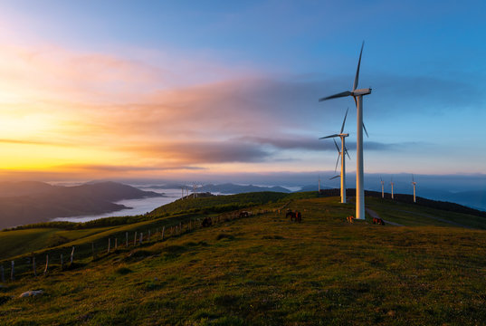 Wind turbines farm at sunrise, Oiz mountain, Basque Country, Spain