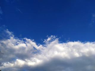 Obraz premium rainy clouds flying in the blue sky