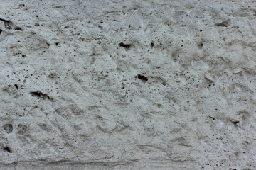 Porous gray limestone background