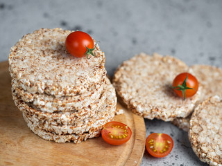 Rice cakes with tomatoes on the table