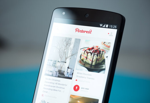 Kiev, Ukraine - September 22, 2014: Close-up shot of Google Nexus 5 smartphone with the Pinterest website on a screen.