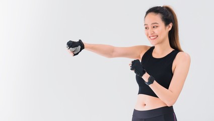 Asian strong boxer woman set the punch card. Portrait of sporty beautiful smiling woman during...