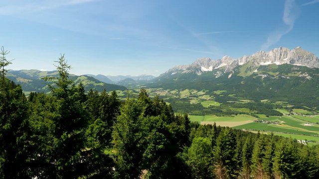 Beautiful alpine landscape with green meadows, alpine mountain peaks, St johan, Tyrol Alps, Austria