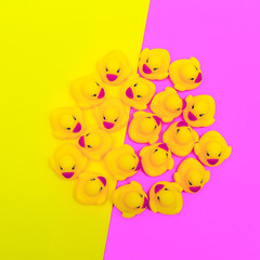 Cute rubber ducklings toys. Minimal flat lay art
