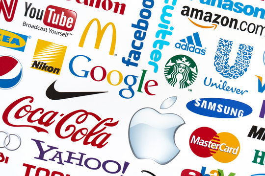 Kiev, Ukraine - February 21, 2012: A logotype collection of well-known world brand's printed on paper. Include Google, McDonald's, Nike, Coca-Cola, Facebook, Apple, Yahoo,  YouTube, and other logos.