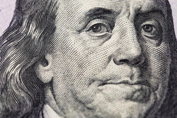 Benjamin Franklin portrait. Hundred dollars banknote closeup macro