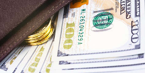 closeup stack metal coins, dollars in wallet