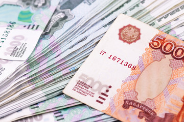closeup stack of Russian bankontes, 1000 and 5000 rubles