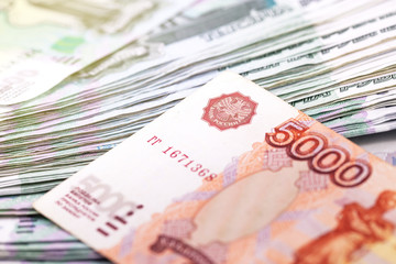 closeup stack of Russian money, bankontes, 1000 and 5000 rubles