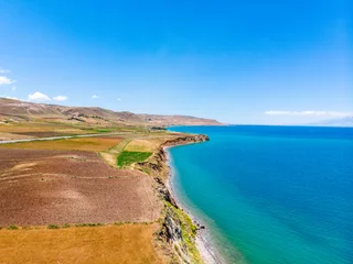 Foto op Plexiglas Aerial view of Lake Van the largest lake in Turkey, lies in the far east of that country in the provinces of Van and Bitlis. Fields and cliffs overlooking the crystal waters. Roads along the lake © Naeblys