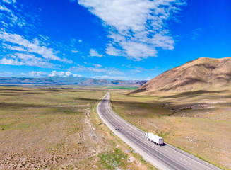 Aerial view of the road leading to Dogubayazit from Igdir. Plateau around Mount Ararat, mountains and hills. Eastern Turkey on the border with Armenia and Iran