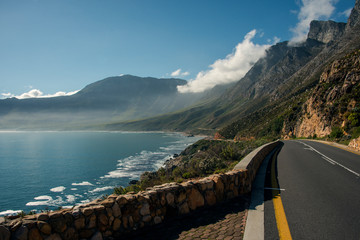 coastal road below mountains