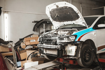 Disassembly of the car for spare parts in garage room. Purchase of spare parts from disassembly.