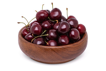 Sweet cherry in wooden bowl