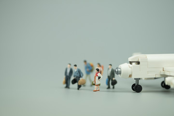 Miniature people : People of travellers with airplane