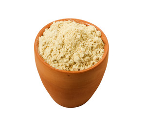 Ginger powder on isolated on a white background. View from above. Flat lay.