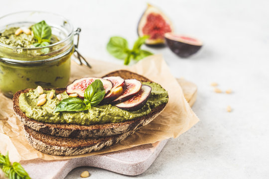 Pesto Sauce Sandwich With Figs On Rye Bread.