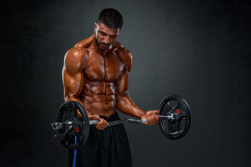Fototapeta na wymiar Strong Muscular Men Lifting Weights