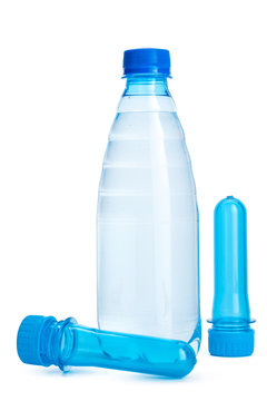 Plastic bottle and PET preform isolated on white background