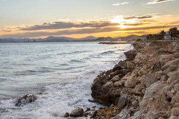 Sunset at Crow's Rock Beach, Malaga, Spain.