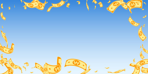 Korean won notes falling. Random WON bills on blue