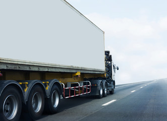 Naklejka na ściany i meble White Truck on highway road with container, transportation concept.,import,export logistic industrial Transporting Land transport on the asphalt expressway