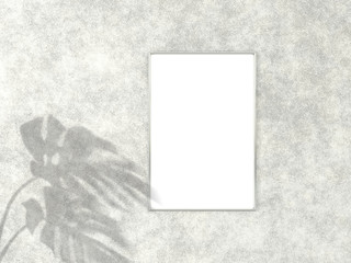 2x3 vertical Chrome frame for photo or picture mockup on concrete background with shadow of monstera leaves. 3D rendering.