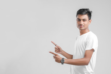 young Indian man giving multiple expression.